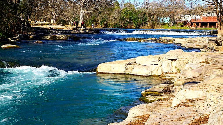 Visitors enjoying the spring-fed San Marcos River in San Marcos, Texas